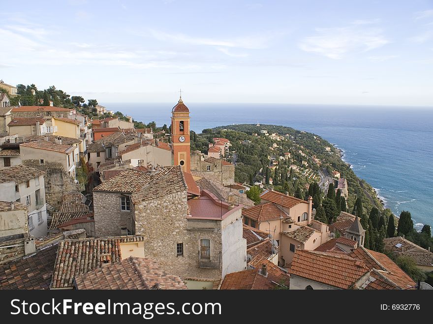Old village of Cap Martin in French Riviera. View of the church against the Mediterranean coast near Monaco. Old village of Cap Martin in French Riviera. View of the church against the Mediterranean coast near Monaco.
