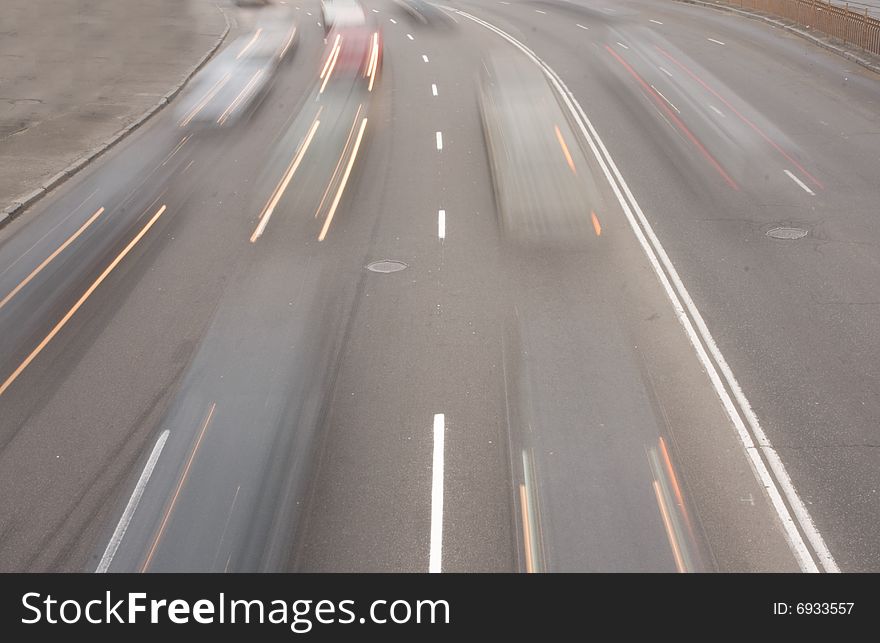 Highway with traffic car in a motion. Highway with traffic car in a motion