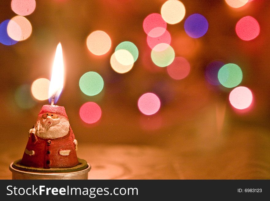 Christmas santa candle lit and colored lights. Christmas santa candle lit and colored lights