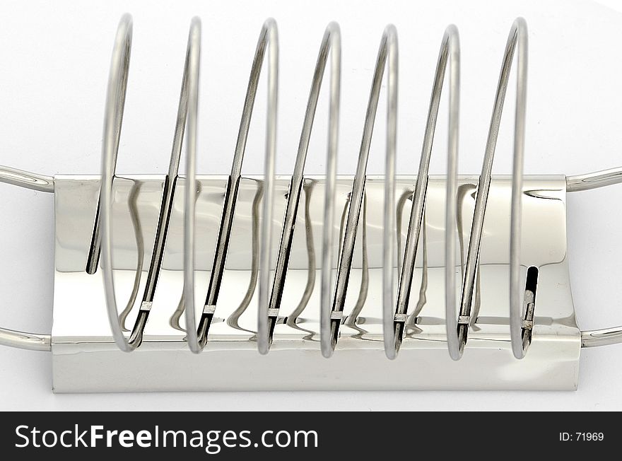 Metallic toast rack on white background. Metallic toast rack on white background