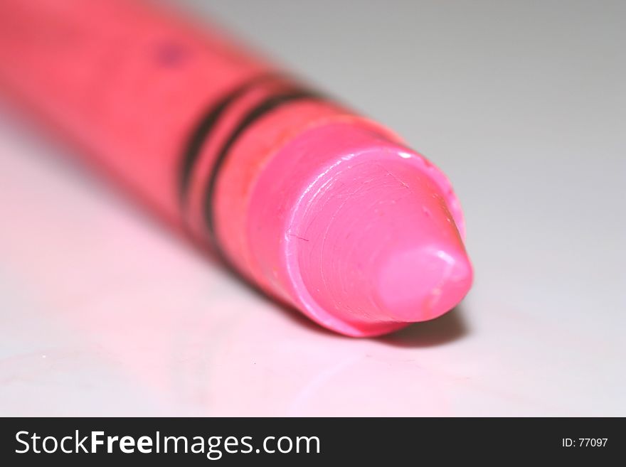 A pink crayon.