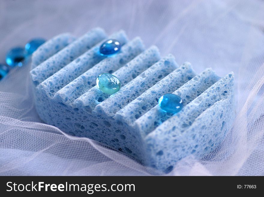 Azure glass drops on azure sponge. Azure glass drops on azure sponge