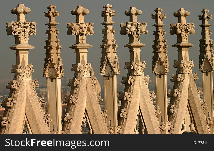Close up of the spires in Milans Gothic masterpiece, the rood of the Duomo, dating back to 1386. Close up of the spires in Milans Gothic masterpiece, the rood of the Duomo, dating back to 1386