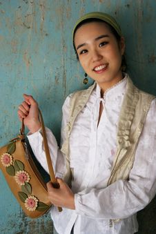 Asian Woman Holding A Handbag Royalty Free Stock Images Asian Woman Holding A Handbag Royalty Free Stock Images