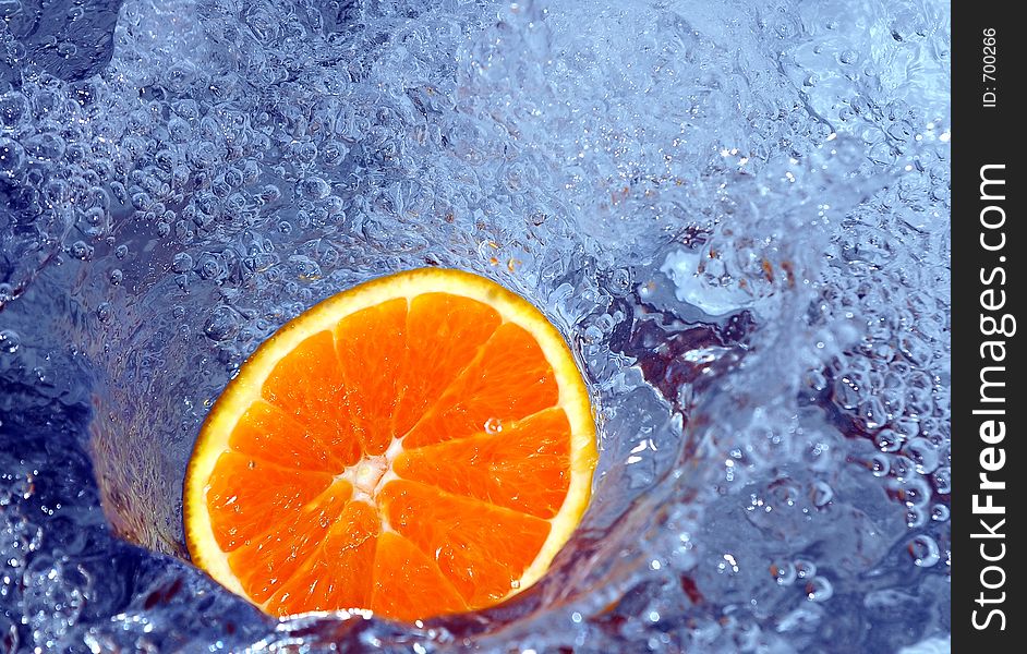 Orange splashing water. Orange splashing water