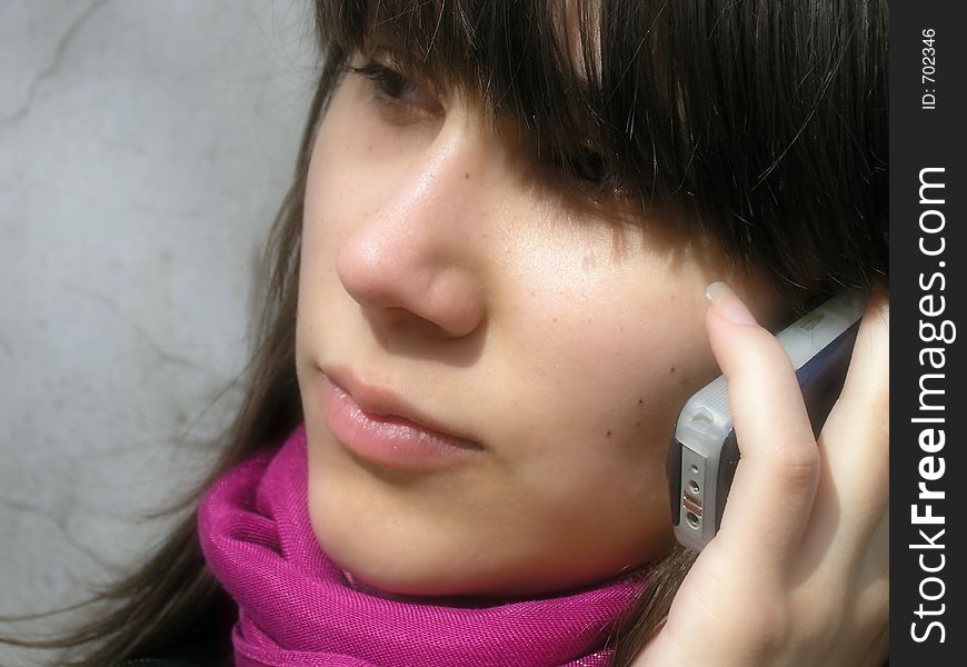 Girl with a phone,light-soft effect
