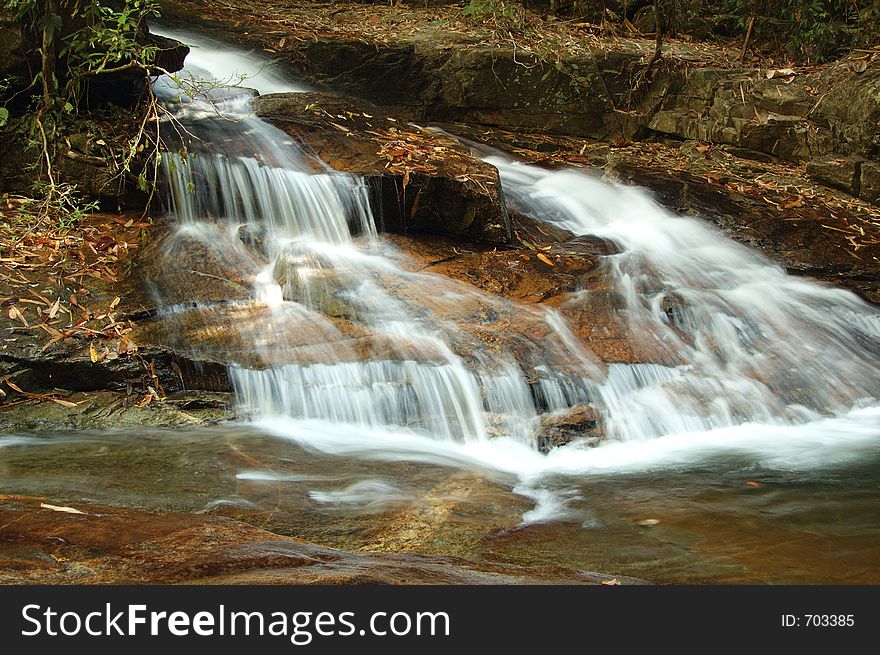 Waterfall in tropical forest of Thailand. Waterfall in tropical forest of Thailand.