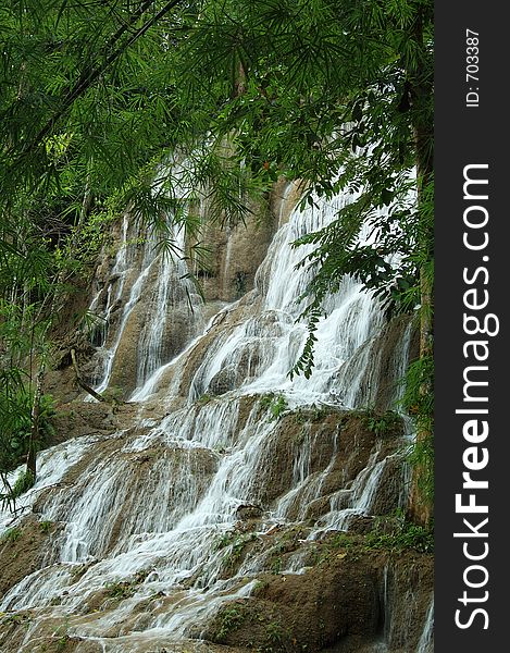 A waterfall in tropical forest of Thailand. A waterfall in tropical forest of Thailand.