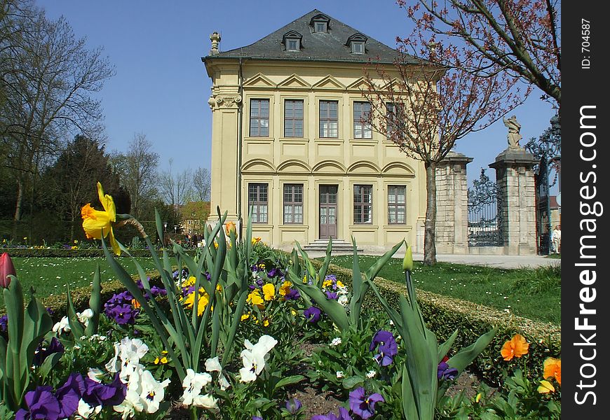 Spring flowers in front on an historic building. Spring flowers in front on an historic building