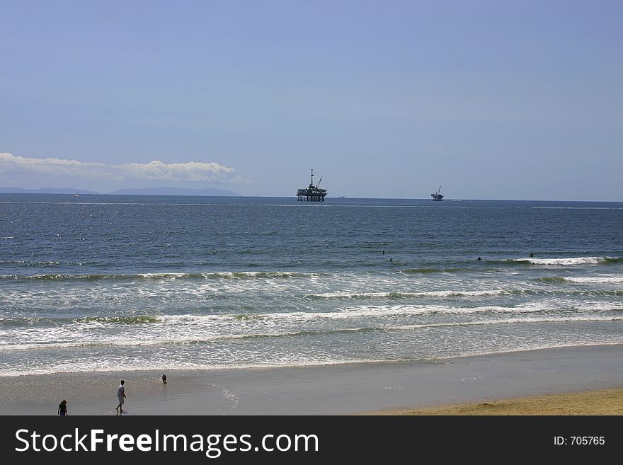 A view of 2 oil drilling platforms from the beach in So. California. A view of 2 oil drilling platforms from the beach in So. California