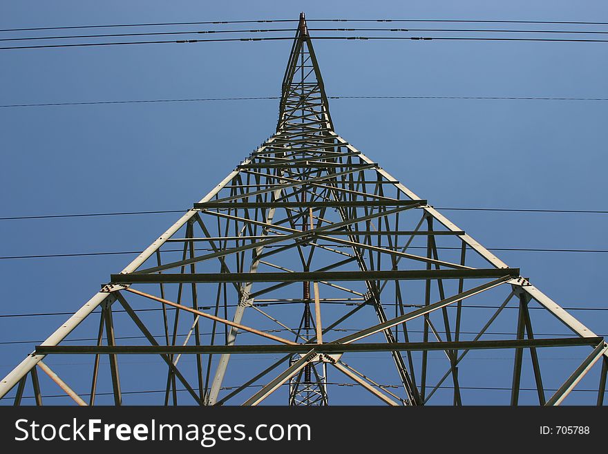 Power pole carrying high voltage from power plant. Power pole carrying high voltage from power plant