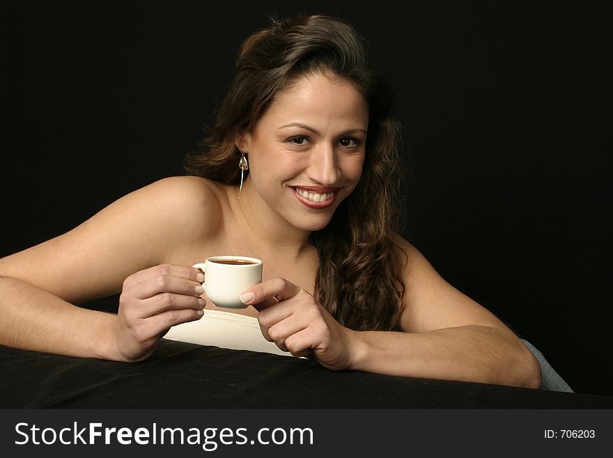 Brazilian woman smiling with cup of hot chocolate. Brazilian woman smiling with cup of hot chocolate