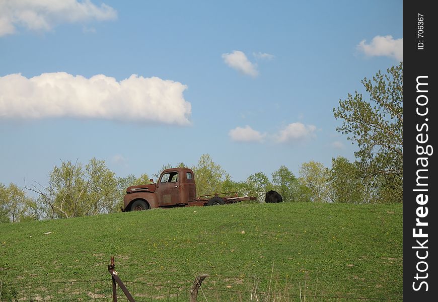 pickup truck rusty on hill