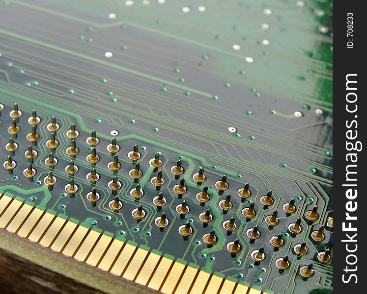 Printed circuit board with pins and connection interface in the foreground