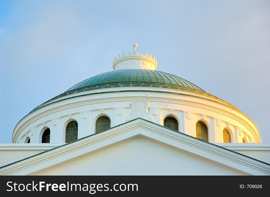 Big white church and clouds