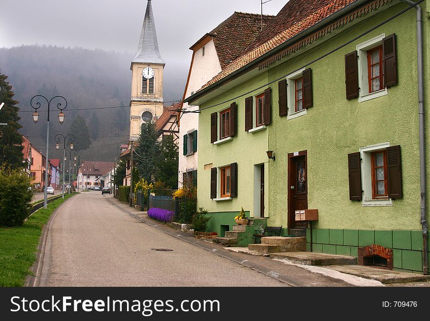 In the street of a alsacian villlage in the summer. In the street of a alsacian villlage in the summer