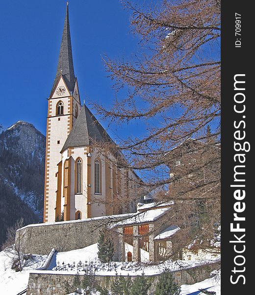 Beautiful soaring church in mountain scenery. Beautiful soaring church in mountain scenery.