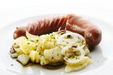 Kransky Sausage With Boiled Potato, Onion And Pump Royalty Free Stock Images Kransky Sausage With Boiled Potato, Onion And Pump Royalty Free Stock Images