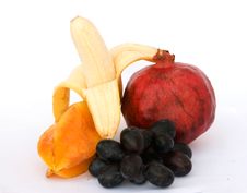 Banana, Pomegranate, Carambola, And Grapes Stock Photo Banana, Pomegranate, Carambola, And Grapes Stock Photo