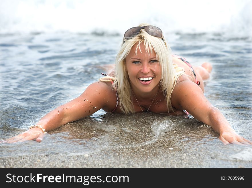 Beautiful Woman On The Beach