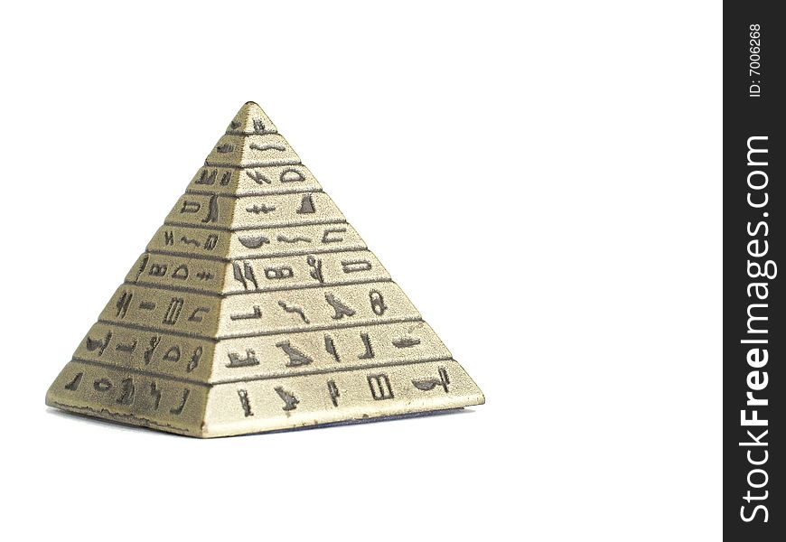 Metal Imitation Of Egyptian Pyramid Macro Isolated On White Background