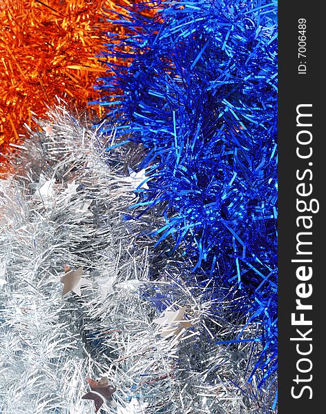 Christmas tinsel decorations, three different colours. Christmas tinsel decorations, three different colours