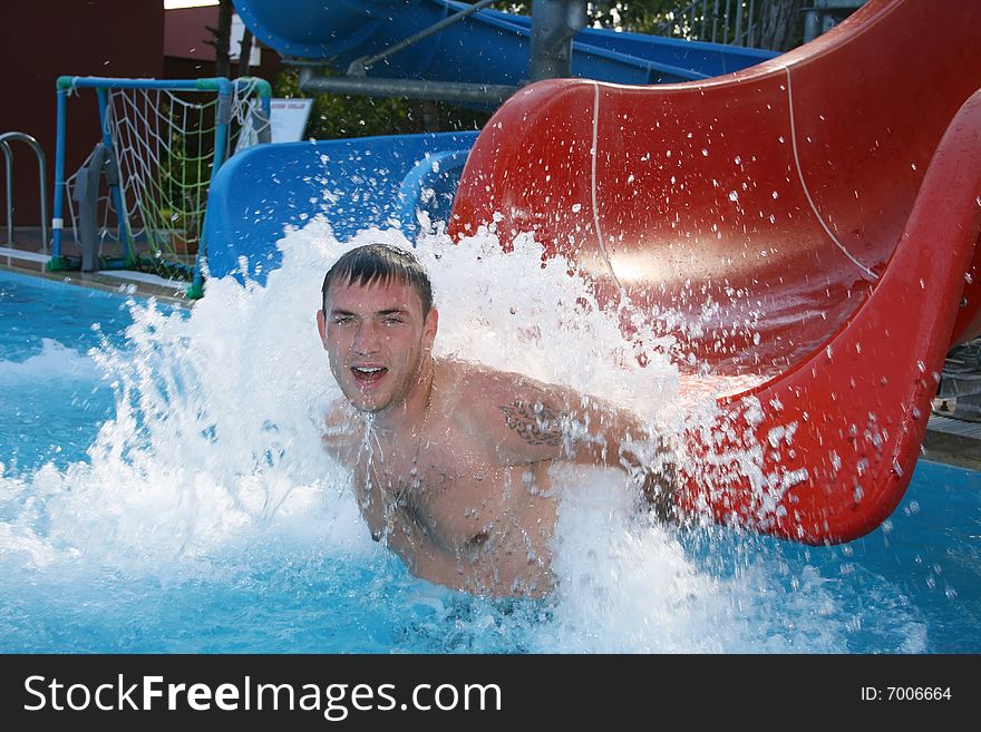 The guy floats in pool. The guy floats in pool