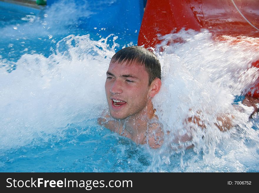 The guy floats in pool. The guy floats in pool