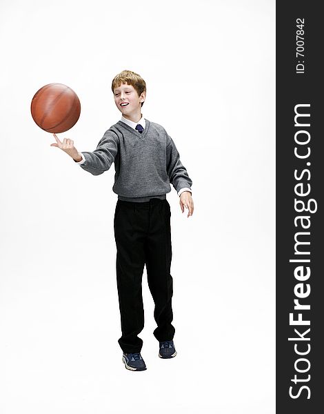 Cultured schoolboy with basketball ball. Cultured schoolboy with basketball ball
