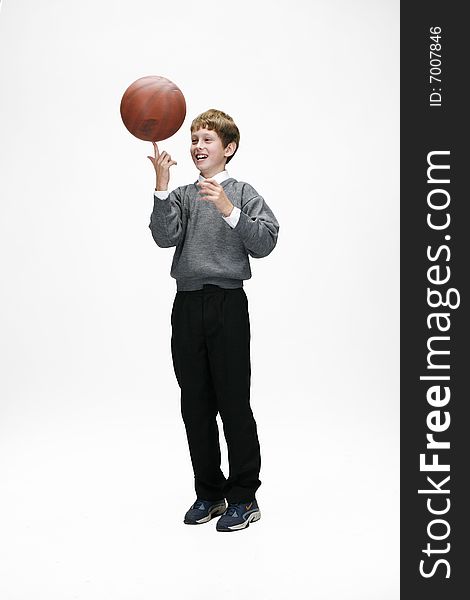 Cultured schoolboy with basketball ball. Cultured schoolboy with basketball ball