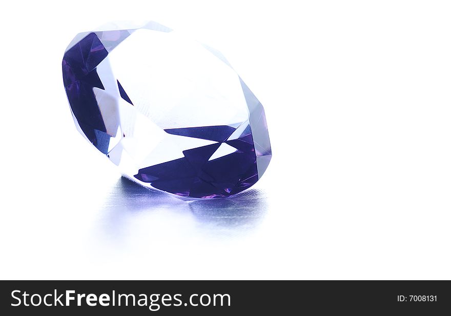 A close up of a diamond over a white background