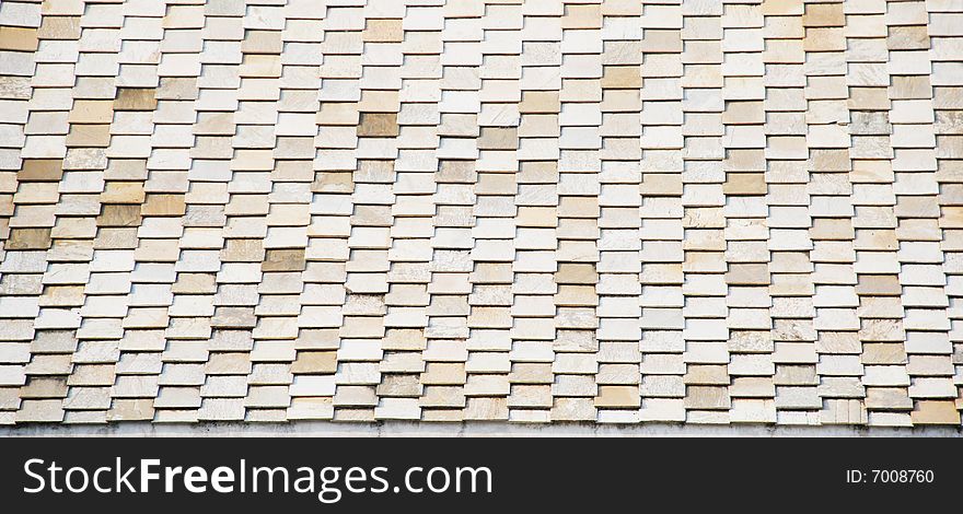 The stone tile roof  of traditional architecture style background. The stone tile roof  of traditional architecture style background.