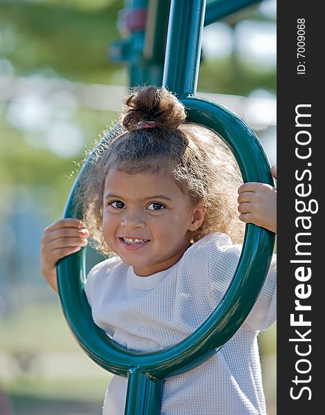 Girl Playing at the Playground. Girl Playing at the Playground