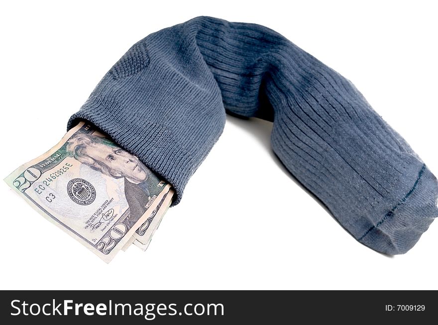 Us currency stuffed into a sock for savings instead of using the bank. Us currency stuffed into a sock for savings instead of using the bank