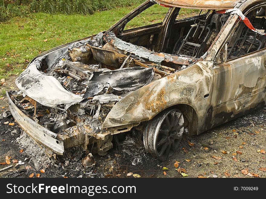 Getaway car destroyed by a fire. Getaway car destroyed by a fire