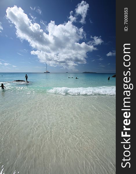 Children playing on a beach on a tropical island. Children playing on a beach on a tropical island