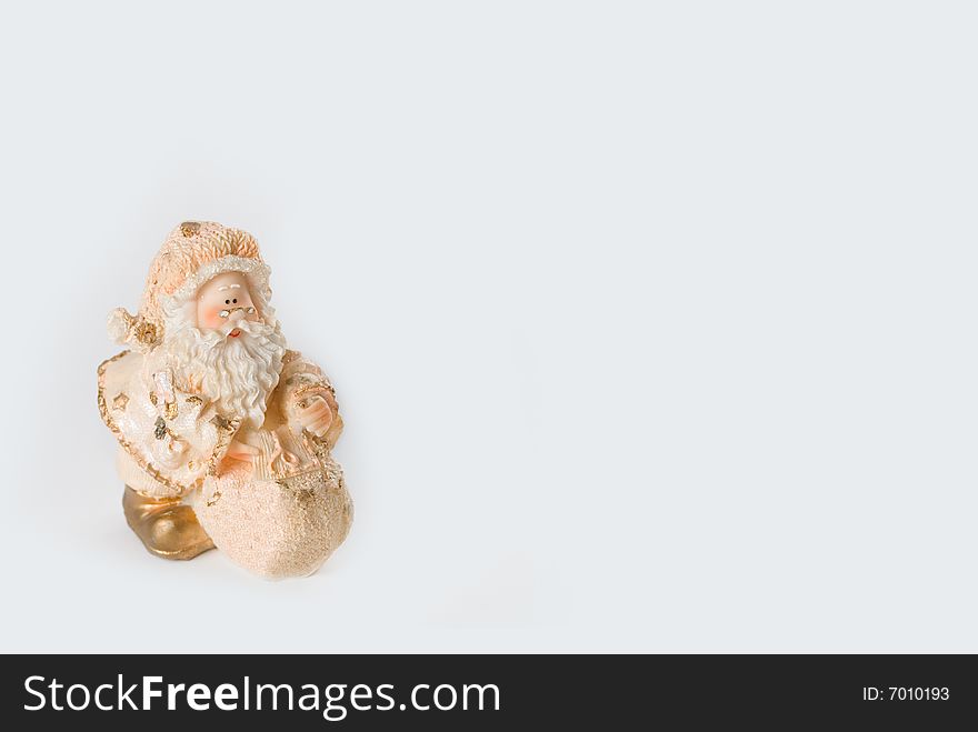 Santa Claus with a bag of gifts isolated on white