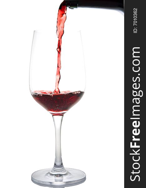 A glass of red wine on white