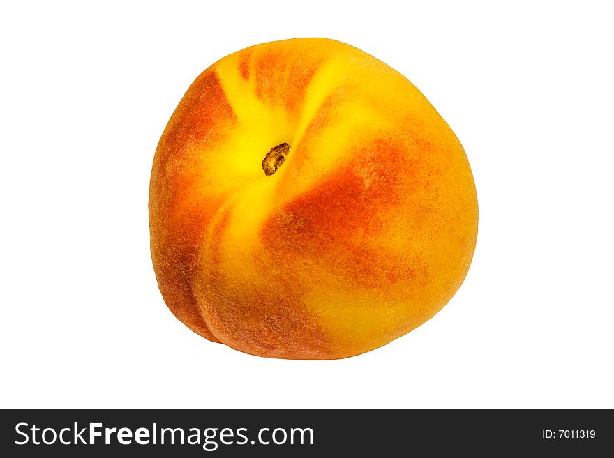 A fresh peach on the white background. A fresh peach on the white background
