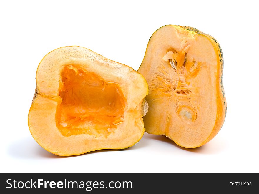 Pumpkin cut on half isolated on the white background