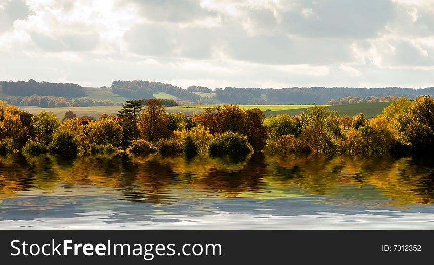 Autumn landscape with trees and river. Autumn landscape with trees and river