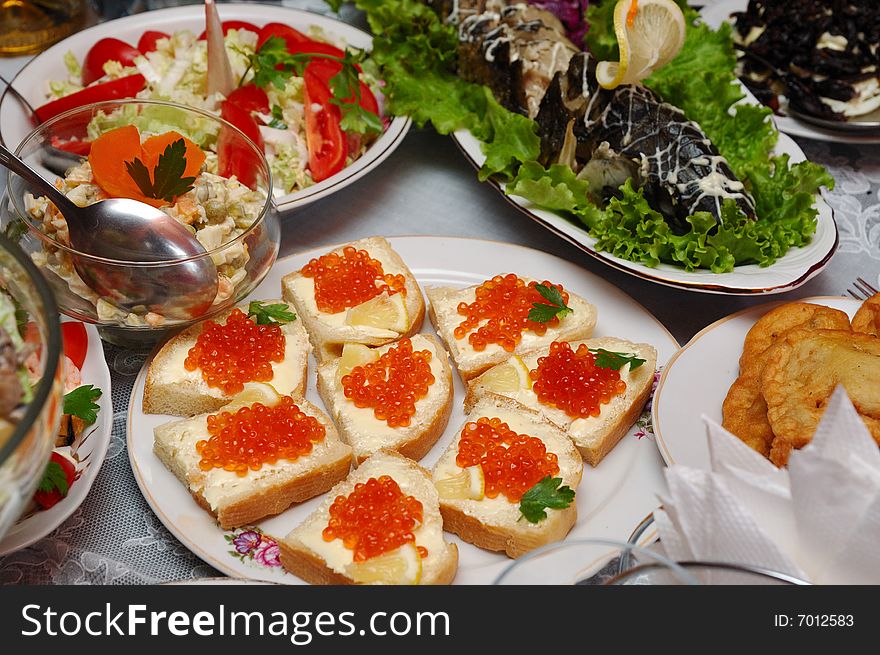 Table served with various dishes. Table served with various dishes