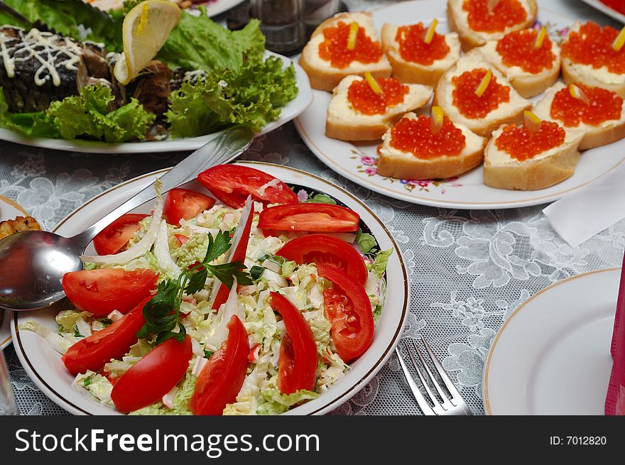 Table served with various dishes. Table served with various dishes