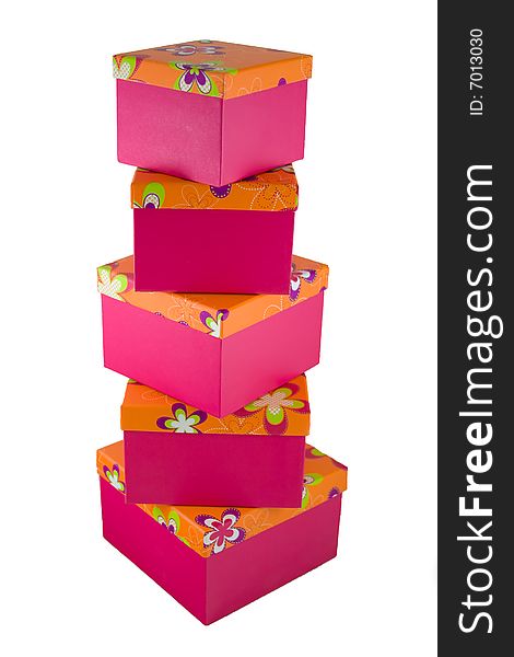 A huge stack of pink with orange flowered top presents. A huge stack of pink with orange flowered top presents.
