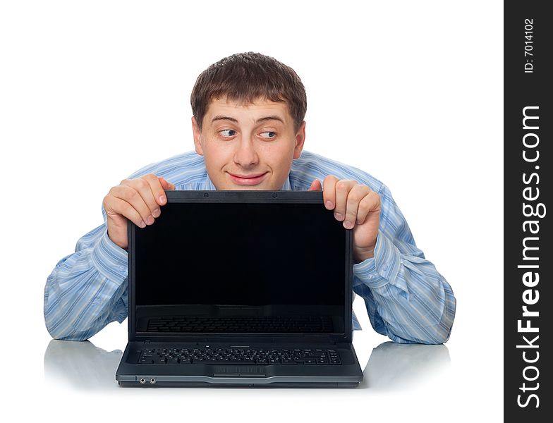 Artful man behind the laptop, isolated on white