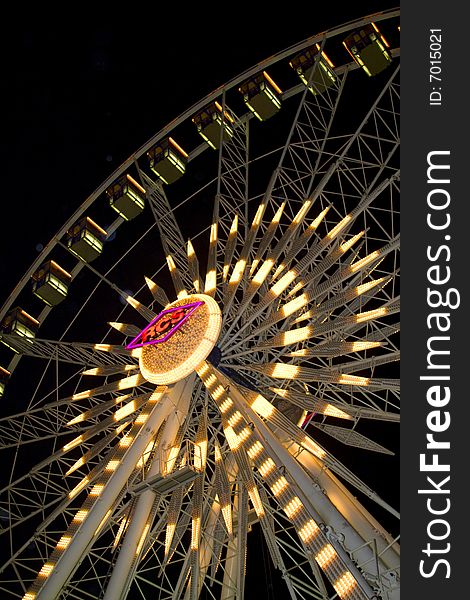 Bright, colorful, ferris wheel at a fair. Bright, colorful, ferris wheel at a fair