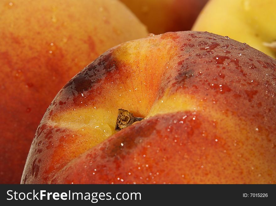 Fresh peaches with drops