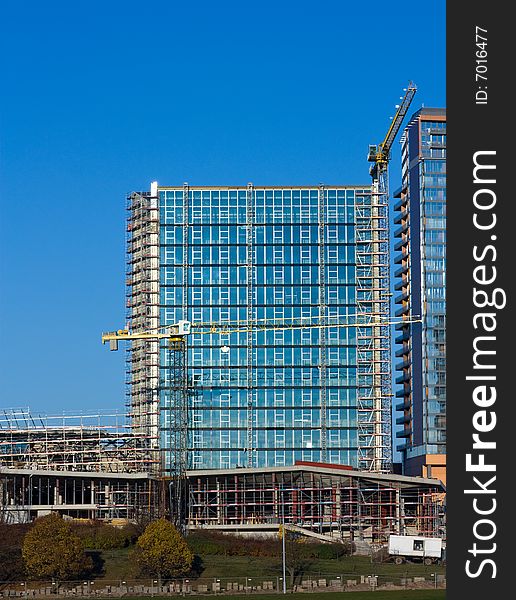 Construction of office building, blue sky
