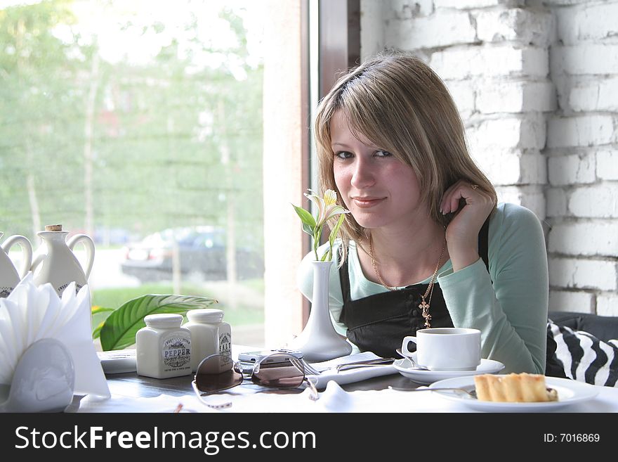 The young girl in cafe. The young girl in cafe