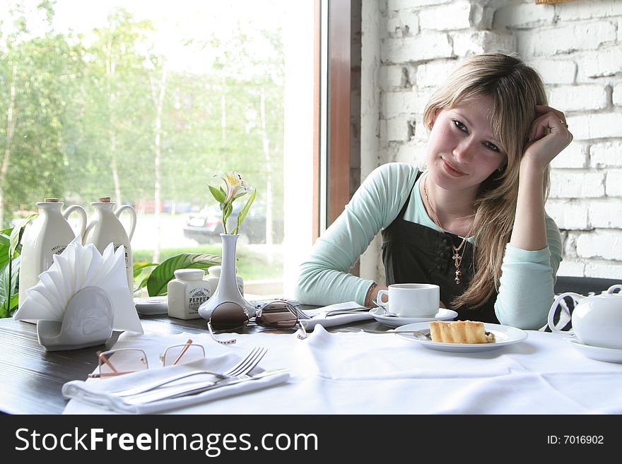 The young girl in cafe. The young girl in cafe